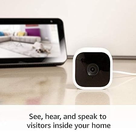 Blink Mini - Compact indoor plug-in smart security camera, 1080p HD video, night vision, motion detection, two-way audio, easy set up, Works with