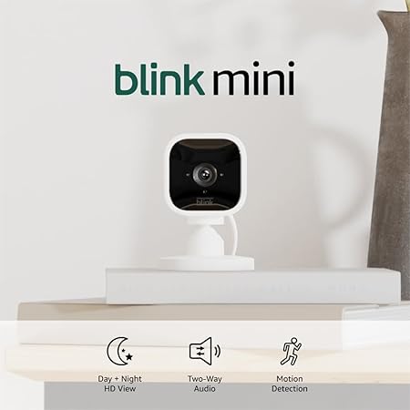 Blink Mini - Compact indoor plug-in smart security camera, 1080p HD video, night vision, motion detection, two-way audio, easy set up, Works with