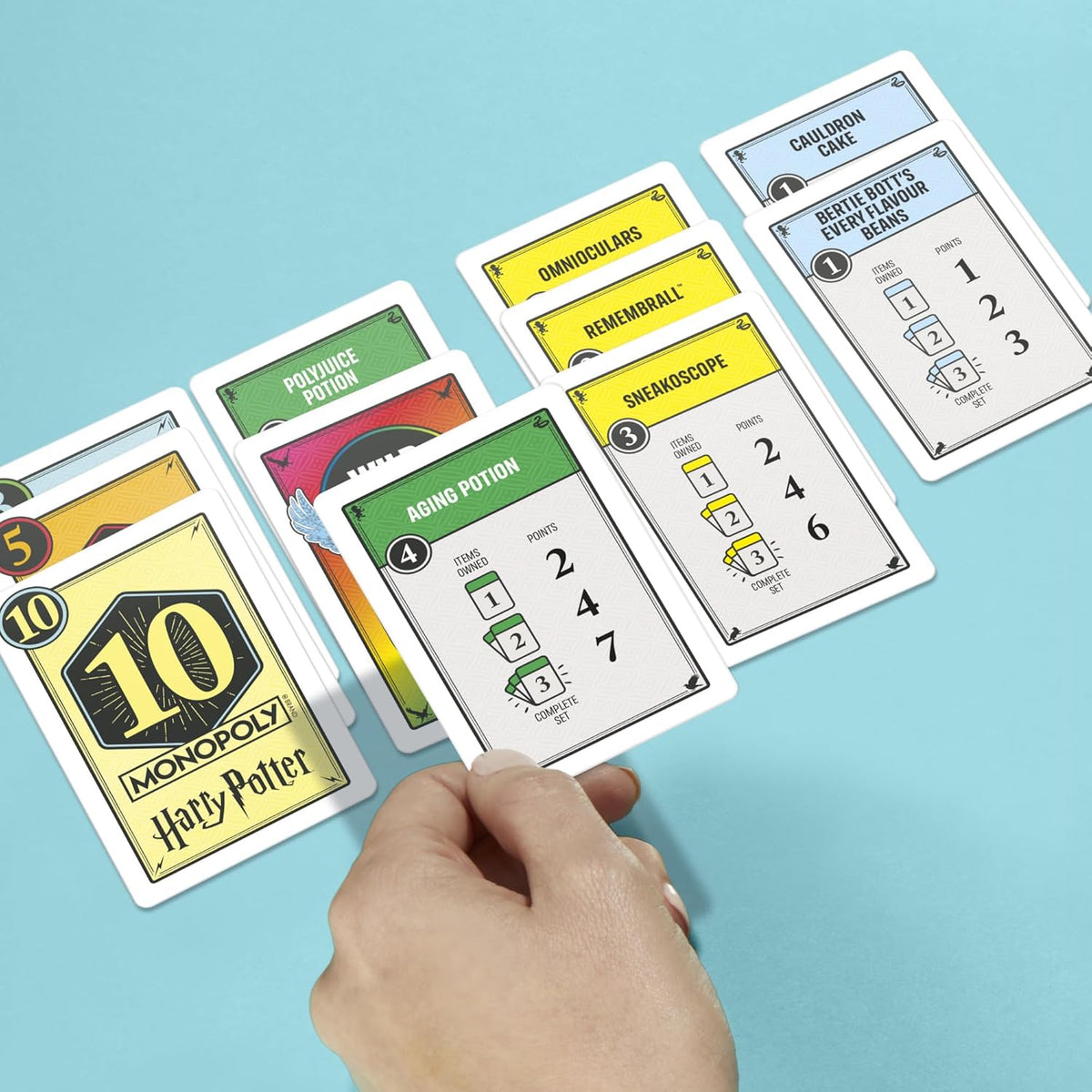 Monopoly Deal: Harry Potter Card Game | Family Games for Kids and Adults | Ages 8 and Up | 2 to 5 Players | 15 mins. | Travel Size | Christmas