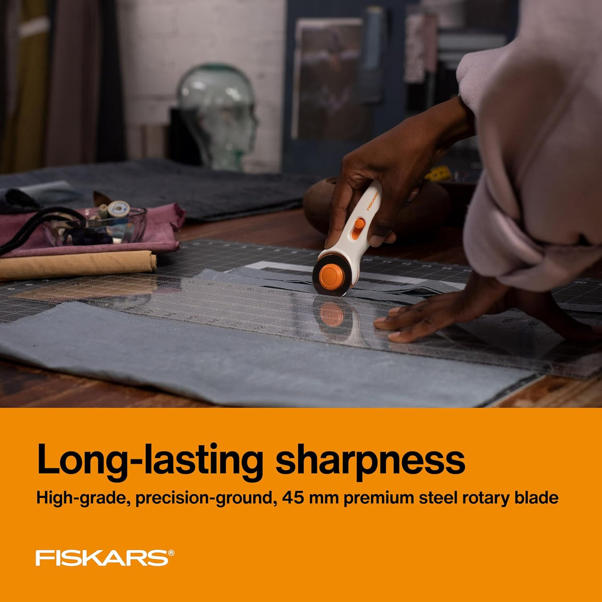 Fiskars 45mm Rotary Cutter for Fabric, Premium Steel Stick Fabric Cutter Cuts Through Multiple Layers, Right and Left Handed, Easy and Safe Blade